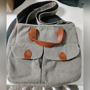 The Village Experience Crossbody Bag